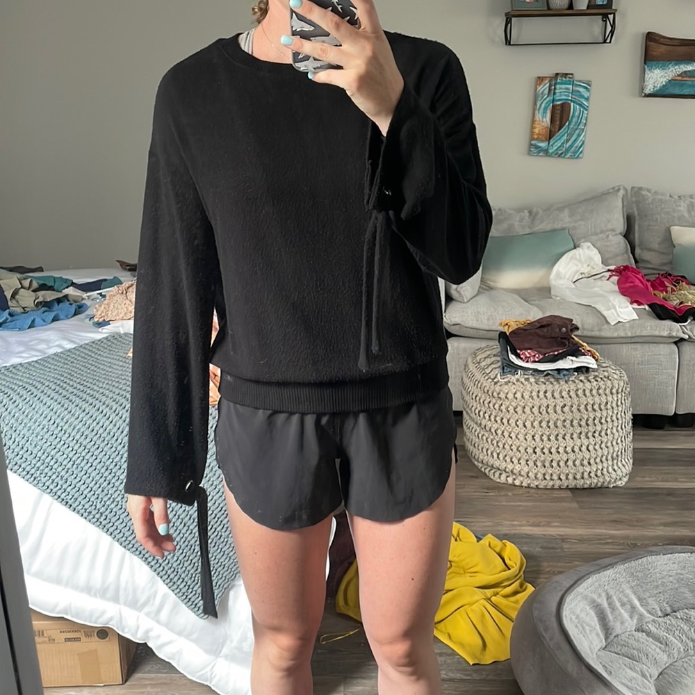 Black bell sleeve top